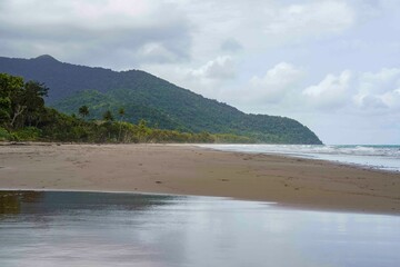 Scenic view of Noah Beach, North Queensland, Australia against the cloudy sky