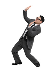 Scared businessman in suit posing on white background