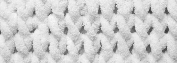 White knitted fabric as background, top view. Banner design