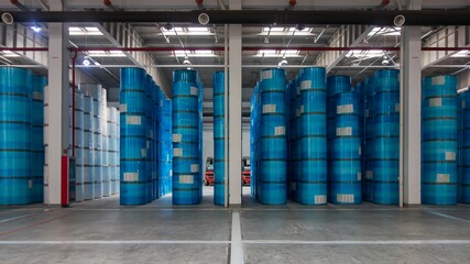 Many of Paper Rolls are Placed on the Floor in a Warehouse