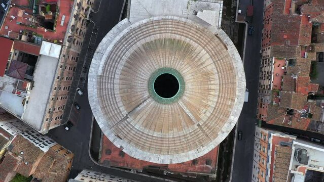 Aerial view of the Pantheon dome, famous monument in Rome, Italy. Former Roman temple, now Catholic church in Roma, Italia seen from drone flying in sky. Building, tourist destination of Italian city