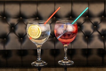 Cocktail glasses with straws