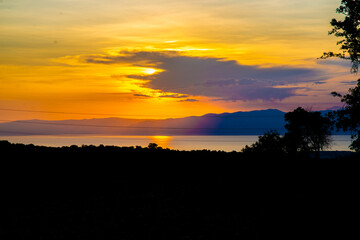 Obraz premium Sunset over lake Albert in the great East African rift valley