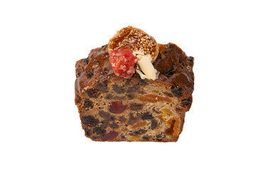 A cake with dried fruits, raisins almonds, dried strawberry.