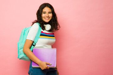 Beautiful teen student going to junior high school - obrazy, fototapety, plakaty