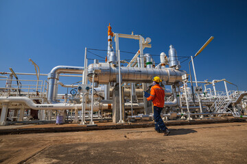 Male worker inspection at the exchanger of tank oil refinery pipeline plant steam vessel and column tank oil of Petrochemistry