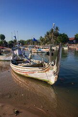 Fototapeta na wymiar fishing boat anchored in the river