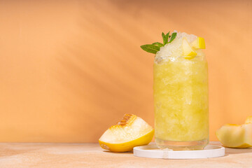 Melon slushie cocktail, Sweet summer refreshing crushed ice slush mocktail with melon juice, milt...