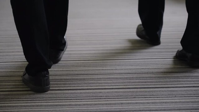 Men's shoes go on the cavroline in the business center.