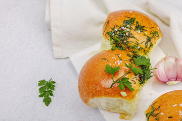 Aromatic garlic buns. Fresh baked goods, a traditional gluten-free soup snack. Parsley, spices