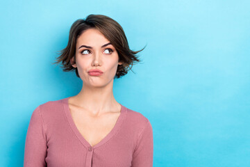 Obraz premium Photo of negative unhappy lady look up empty space dislike unpleasant situation wear pink shirt isolated blue color background