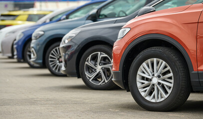 Row of cars. Rental services or buying and sale of used automobiles - 605324539