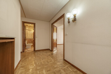 A hall of a residential house with oak floors
