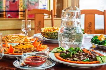 Asian food dishes, sauces and glass