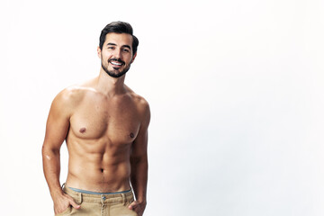 Fototapeta na wymiar Male athlete model with naked torso and packs of abs sporty on white isolated background, trendy clothing style, copy space, space for text
