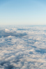 Looking at the cloudscape through airplane window