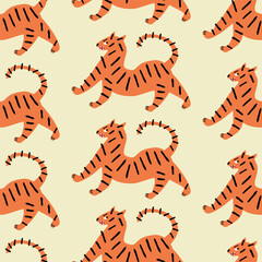 Funny tigers hand drawn vector illustration. Wild safari animal seamless pattern for kids fabric or wallpaper.