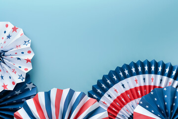 Fototapeta 4th of July background. USA paper fans, Red, blue, white stars and confetti on blue wall background. Happy Labor Day, Independence Day, Presidents Day. American flag colors. Mock up. Top view. obraz