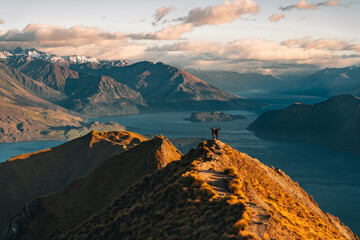 Roys peak beautiful mountain landscape background. Lake Wanaka New Zealand. Top view mountains overlooking scenic view of alpine landscape. Hiking in New Zealand. Popular tourism and travel location