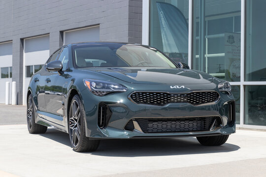 Kia Stinger Sports Sedan display at a dealership. Kia offers the Stinger in GT2 and GT-Line models.