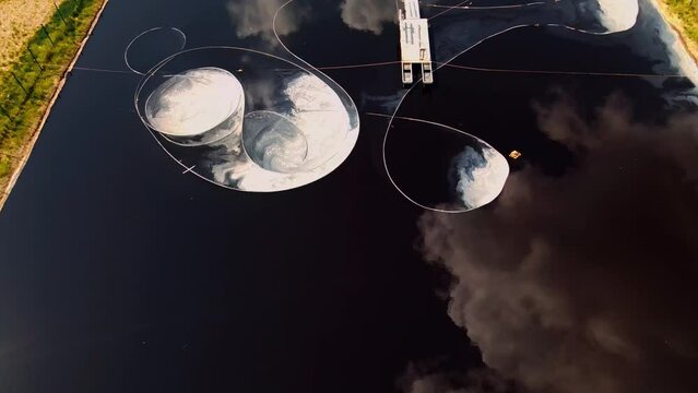 Water treatment equipment. Dirty water filtration outside. Biological purification in a pond. Dirty water infiltration into the pond