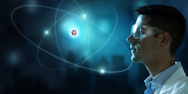 Scientist looking at virtual atom structure model with nucleus and glowing electrons. 3d rendering element. Concept of nuclear power.