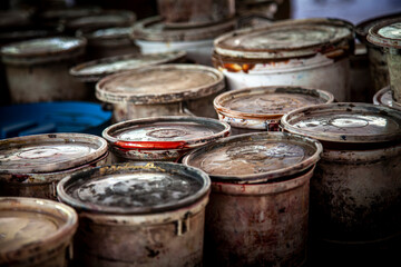 old plastic paint cans
