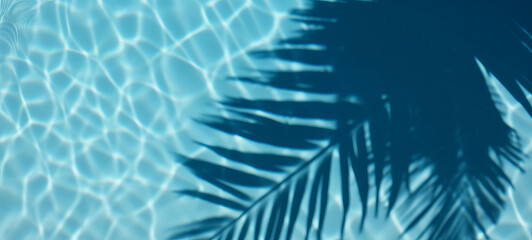 Summer tropical background. Swimming pool with tropical leaf shadow. Generative ai