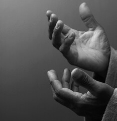 praying to god with hands together with people stock photo