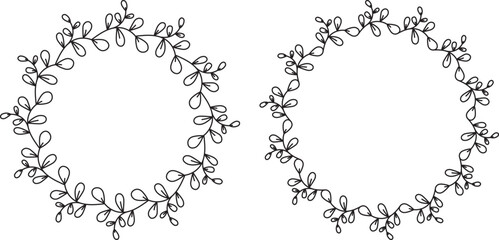 Set of two vector hand drawn floral frames. Round black wreath of decorative doodle branches and leaves