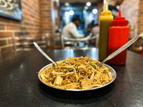 plate of tasty veg chowmin in the restaurant