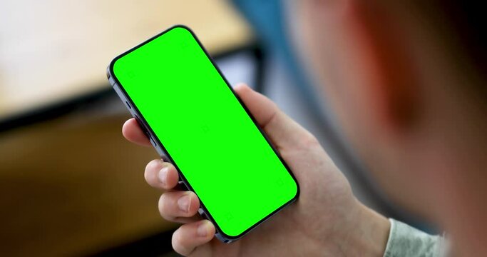 Smartphone in hand, static footage with little hand moves. indicators on the screen to track movement