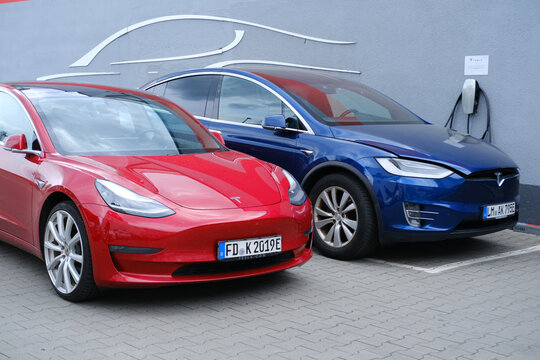cars parked in Tesla office, service station, American electric car manufacturer Elon Musk, current and major repairs, alternative energy concept, electric vehicle production, Frankfurt - May 2023