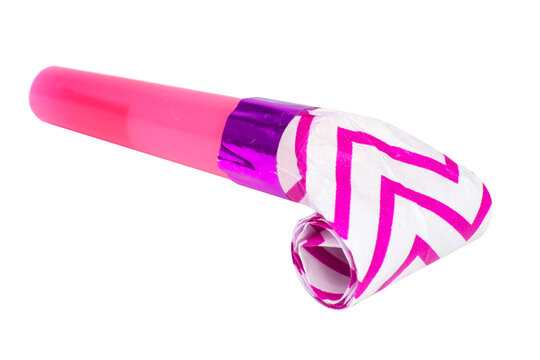 Rolled festive noisemaker or party whistle horn on the white isolated