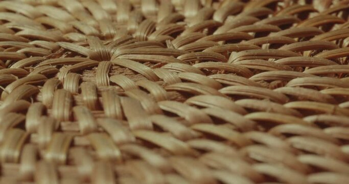 Abstract closeup of wicker bamboo. Texture background footage.
