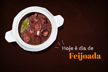 Brazilian feijoada on brown background with phrase 