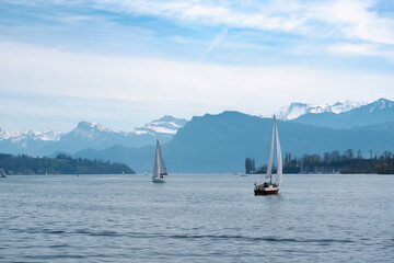 Sailing boats at lake Luсerne, Switzerland, concept of travel vacation in Europe