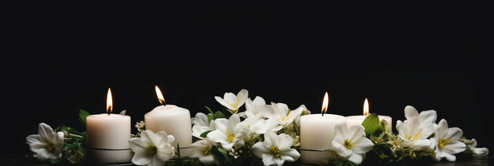 Burning candles and white flowers on black background. AI generative