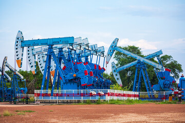 In the field country crude oil industry the oil rig pump in the evening of the pumping
