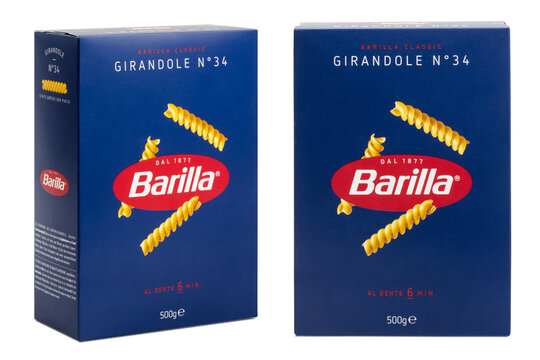 Munich, 05.22.2023: box of Italian Barilla "Girandole" noodles / pasta isolated over a transparent background, classics series, cut-out original packaging, front view and in an angle
