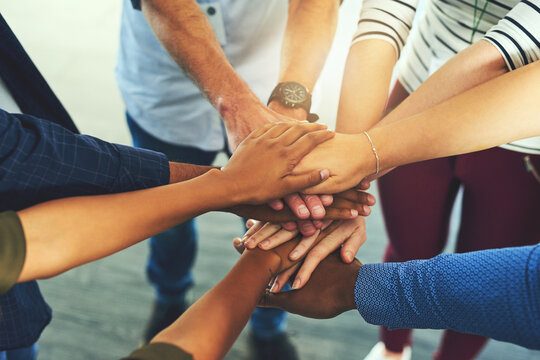 Team trust, hands together and motivation of staff with collaboration, support and community. Diversity, worker friends and group with achievement, solidarity and agreement hand sign for teamwork