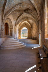 Fototapeta na wymiar Entrance cloister to the medieval stone church of the picturesque village of Anento, Zaragoza.