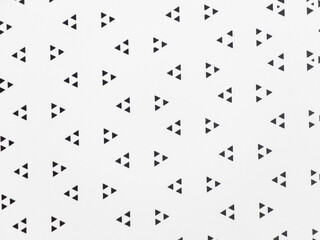 Naklejka premium Arrow-shaped triangular perforated sheet Eye-catching triangular shape The arrow-shaped surface adds to the uniqueness and beauty of this steel plate.The invention of an arrow-shaped plate. close up.