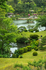 Fototapeta na wymiar 広島 縮景園の迎暉峰から眺める夏の日本庭園