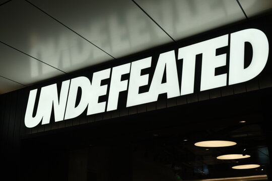 Shanghai,China-Jan.1st 2023: close up Undefeated store brand logo. American clothing and shoe brand