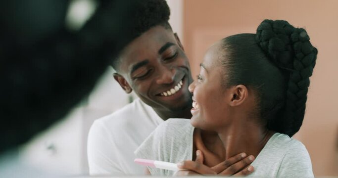 Family, black couple with pregnancy test and happy together in their bathroom at home. Happiness or excited, love or care and African people smiling for good news or pregnant woman for celebration