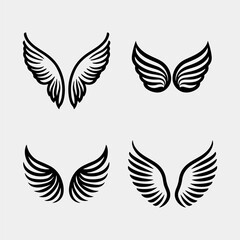 Fototapeta na wymiar Set of hand drawn bird or angel wings of different shape in open position