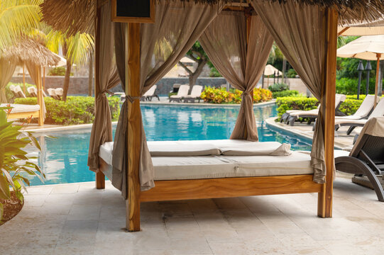 Bungalow next to blue pool