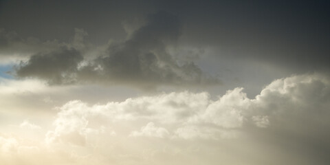 Obraz premium Thick gray clouds cover the sky, background. Cloudscape. Panoramic image.