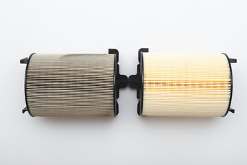New Clean and Old Dirty Air Filter for a Turbocharged Car Engine.